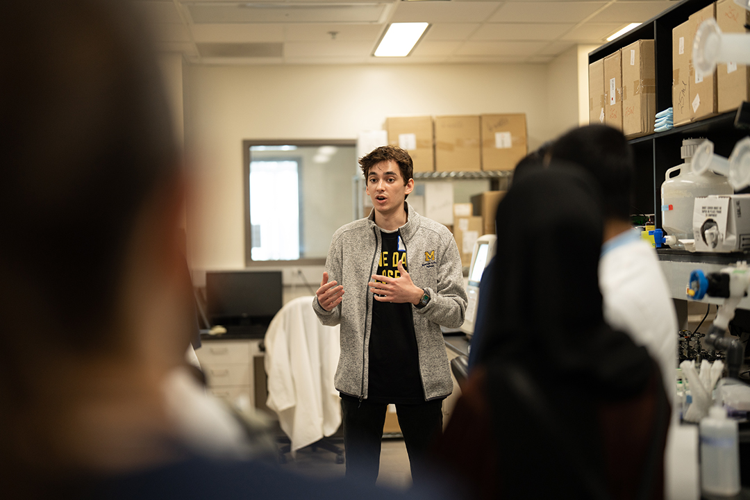MCP Graduate Student Noah Puleo introduces students to a research laboratory.